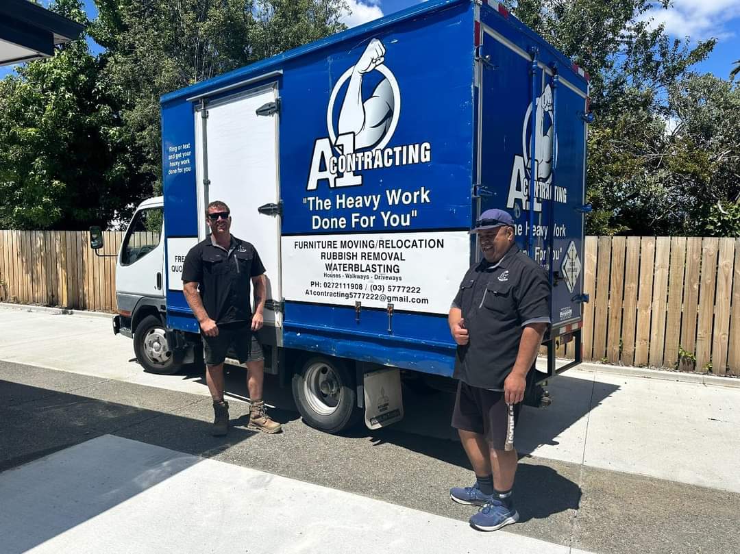 A1 Contracting team members in Blenheim Marlborough with moving truck